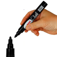 uni PWE-5M medium liquid chalk marker held in hand, 16 colours available at PoscART