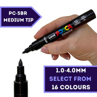 POSCA PC-5BR brush tip paint marker held in hand, 16 colours available at PoscART