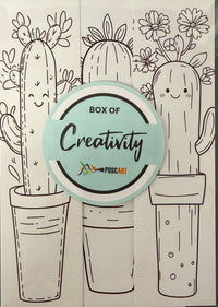 POSCA colour-in bookmarks cactus theme, coloured bookmarks resting on book pages