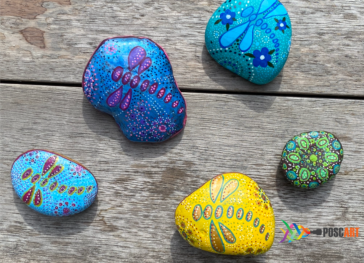 Rocks decorated with dot designs using POSCA PC-5M Indigenous Modern tones