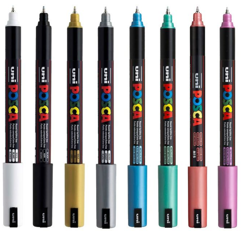 The eight POSCA PC-1MR metallic markers uncapped in a line