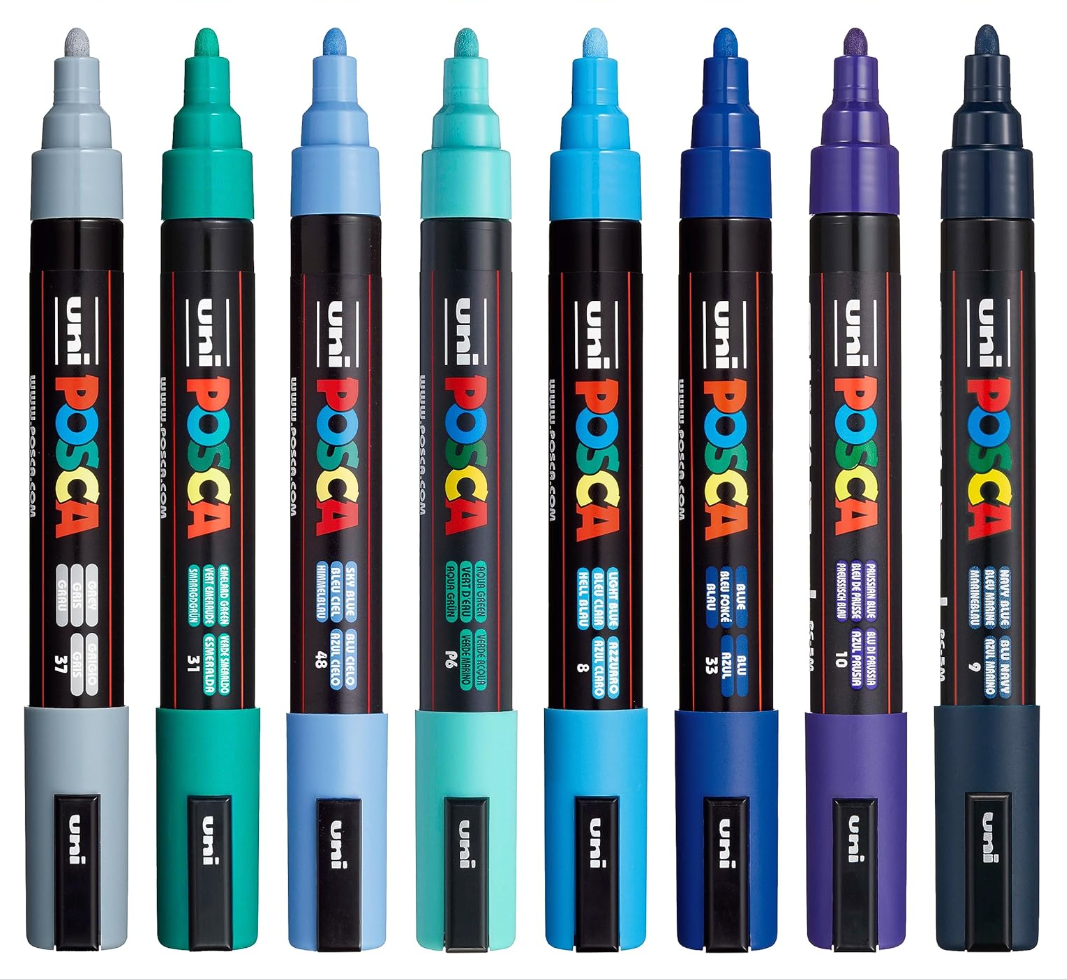 POSCA PC-5M cool tone markers standing upright showing caps and labels