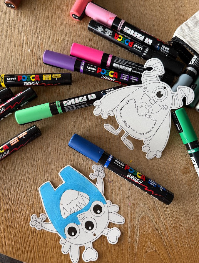 PoscART colour in monster cards set of 8, cards being coloured with POSCA paint markers
