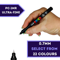 POSCA PC-1MR ultra fine 0.7mm paint marker held in hand, 22 colours available at PoscART