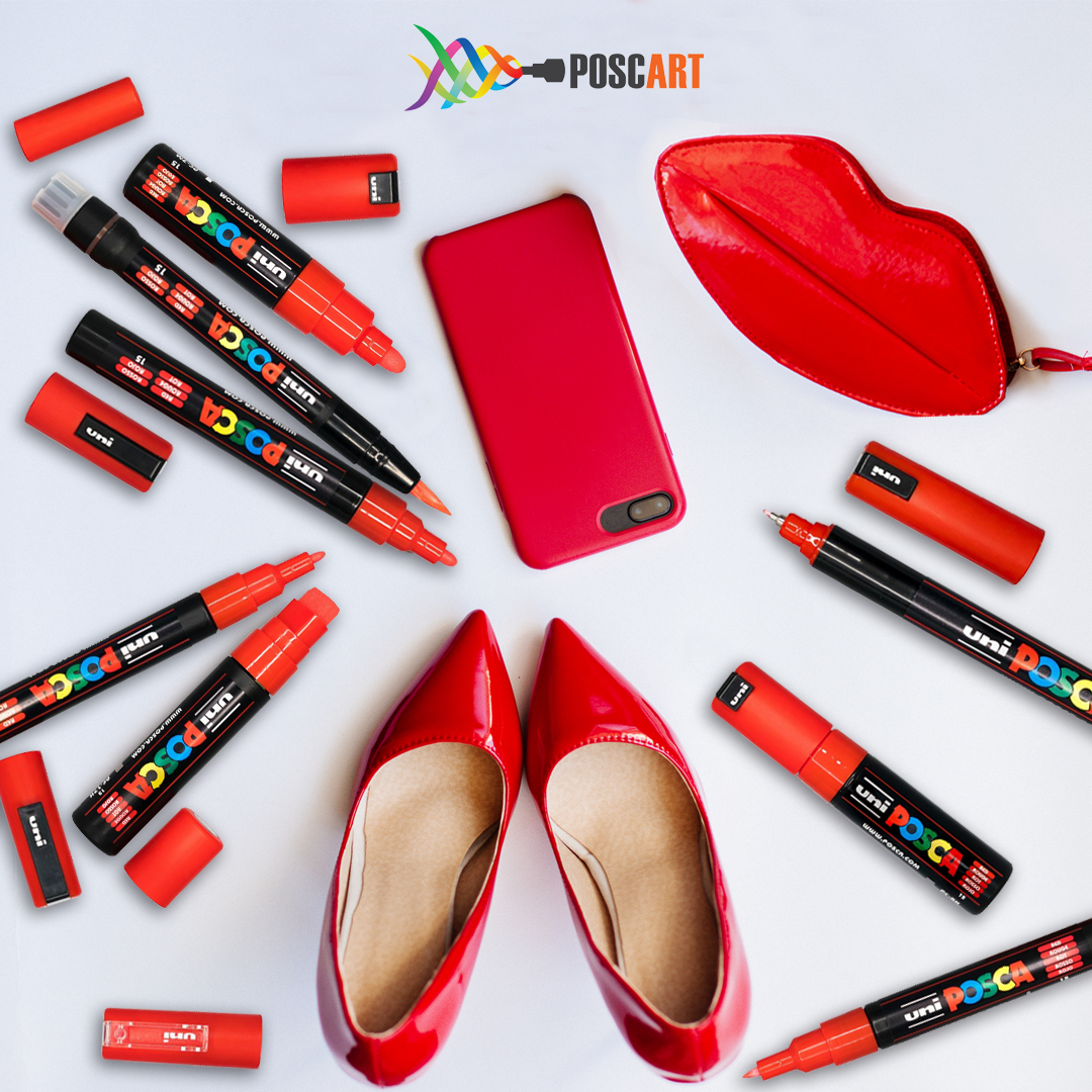 POSCA red markers decorating fabric shoes, accessories and stationery